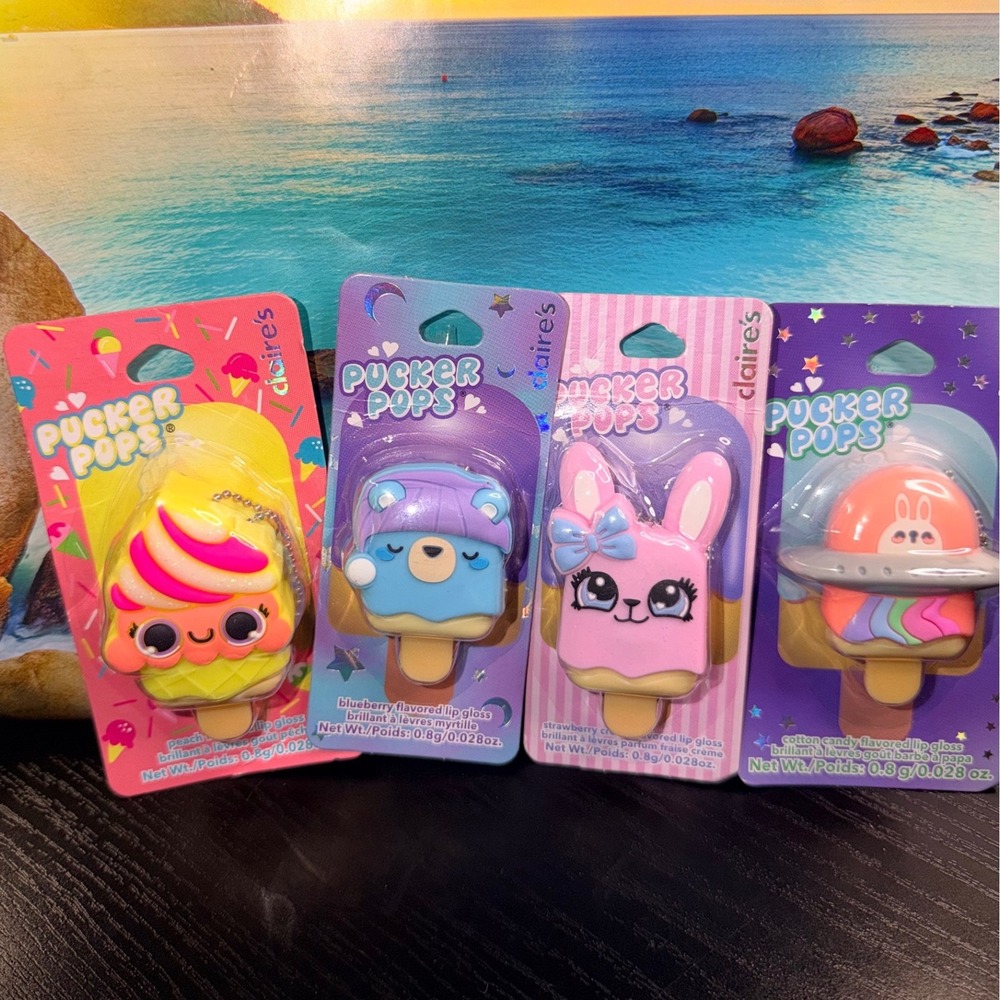 Claire's Pucker Pops Lip Gloss 4 Pack Peach Blueberry Strawberry Cotton Candy
